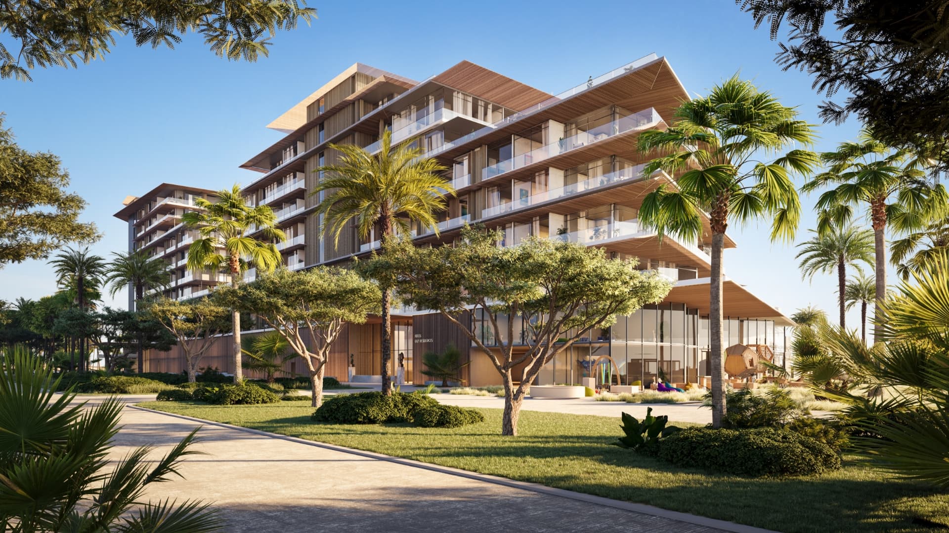 Rixos Dubai Islands residences with terraced balconies facing the private beach
