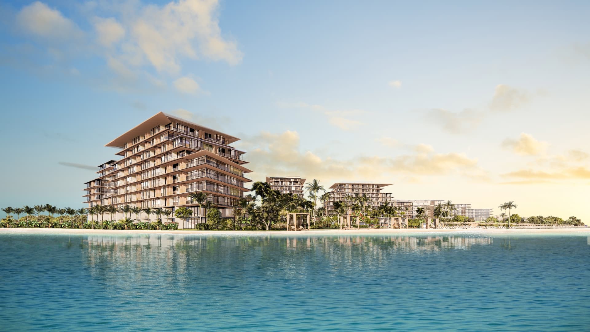 Beach houses at Rixos Dubai Islands with gardens leading onto the sand